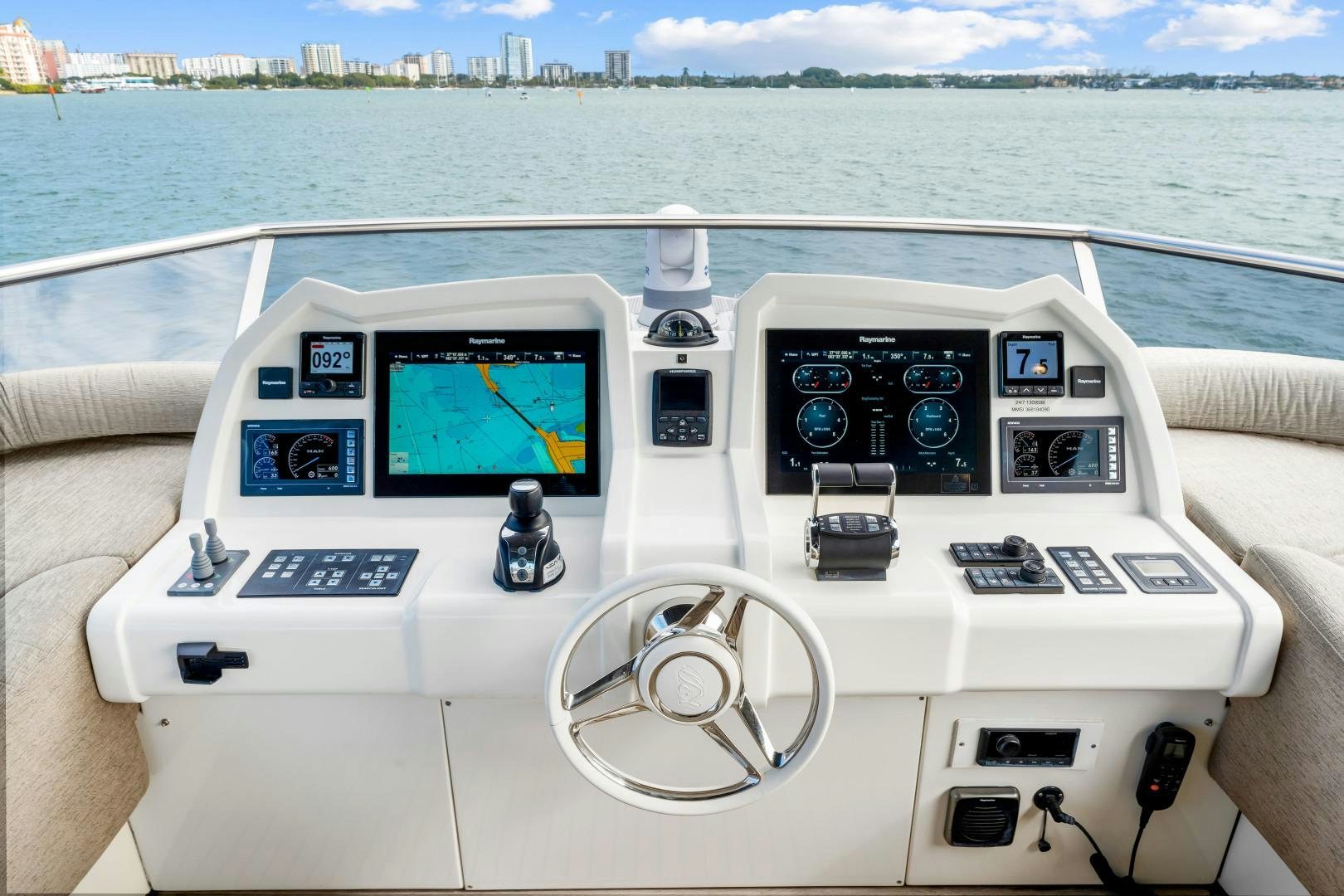 a white vehicle with a screen and buttons on the front aboard MONTE CARLO Yacht for Sale