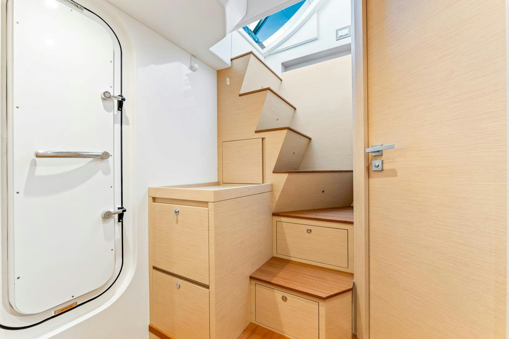 a room with a closet and a door aboard MONTE CARLO Yacht for Sale