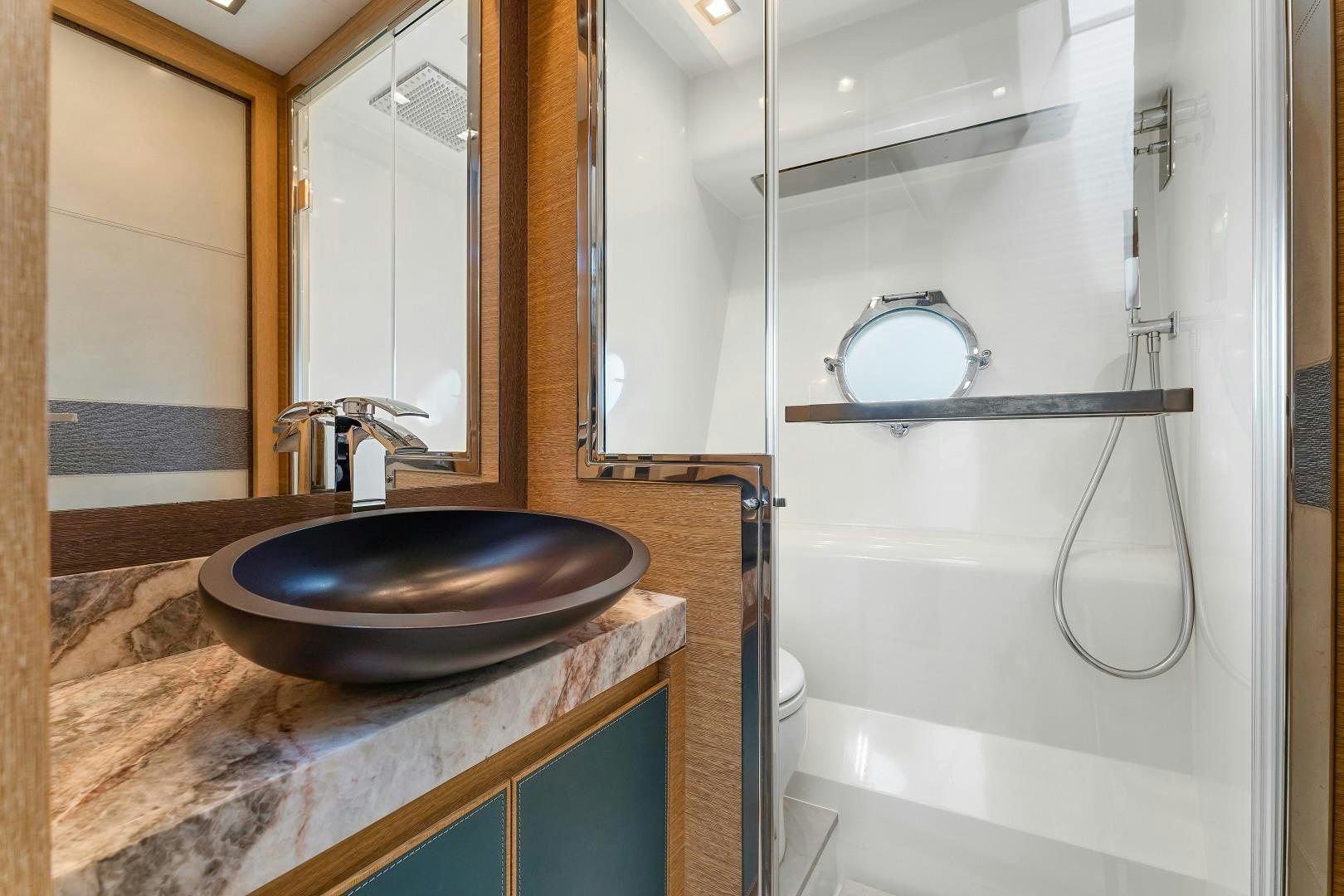 a sink and a mirror in a bathroom aboard MONTE CARLO Yacht for Sale