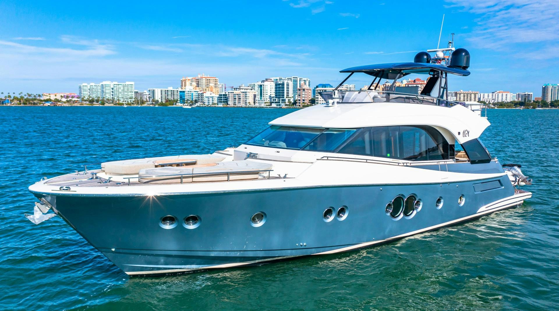 a white yacht in the water aboard MONTE CARLO Yacht for Sale