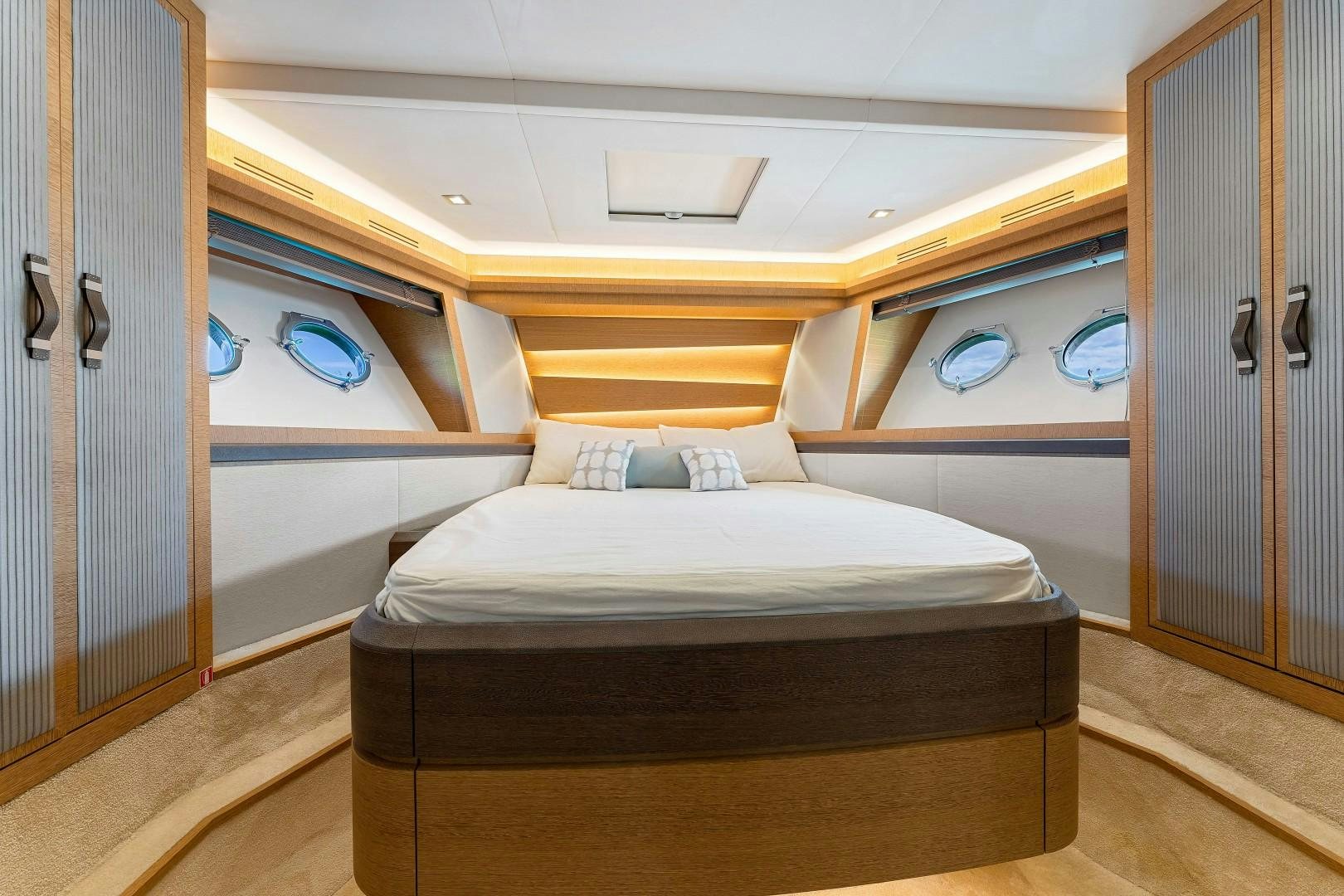 a bed in a room aboard MONTE CARLO Yacht for Sale