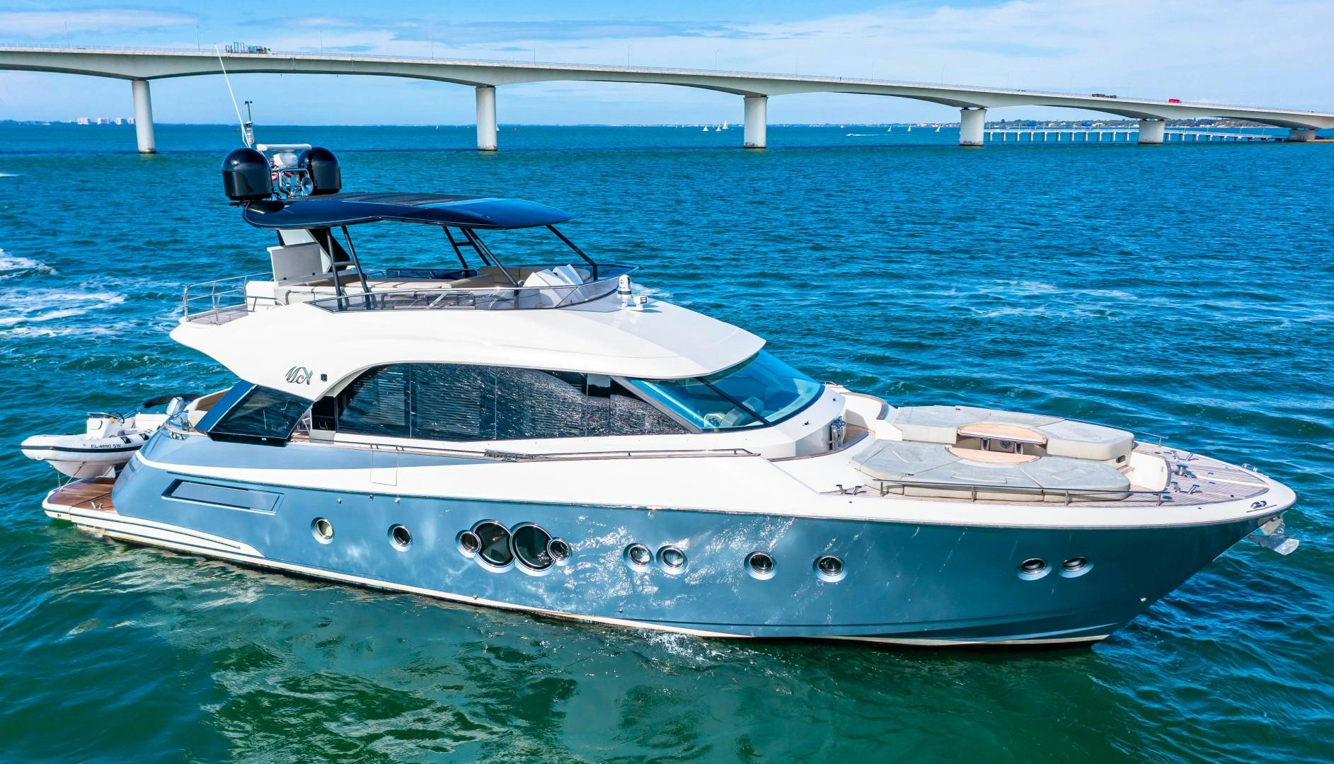 a white yacht in the water aboard MONTE CARLO Yacht for Sale