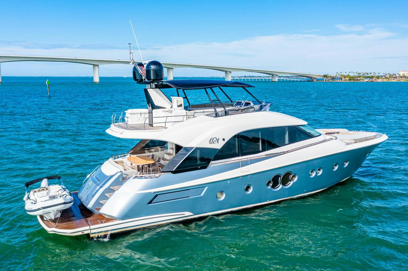 a white yacht in the water aboard MONTE CARLO Yacht for Sale
