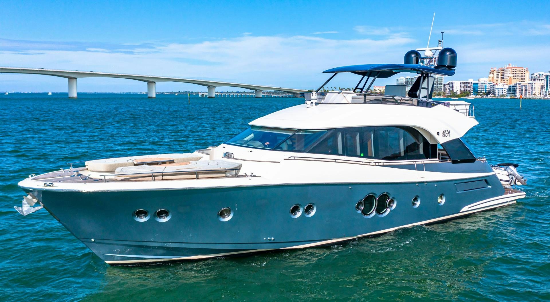 a white boat in the water aboard MONTE CARLO Yacht for Sale