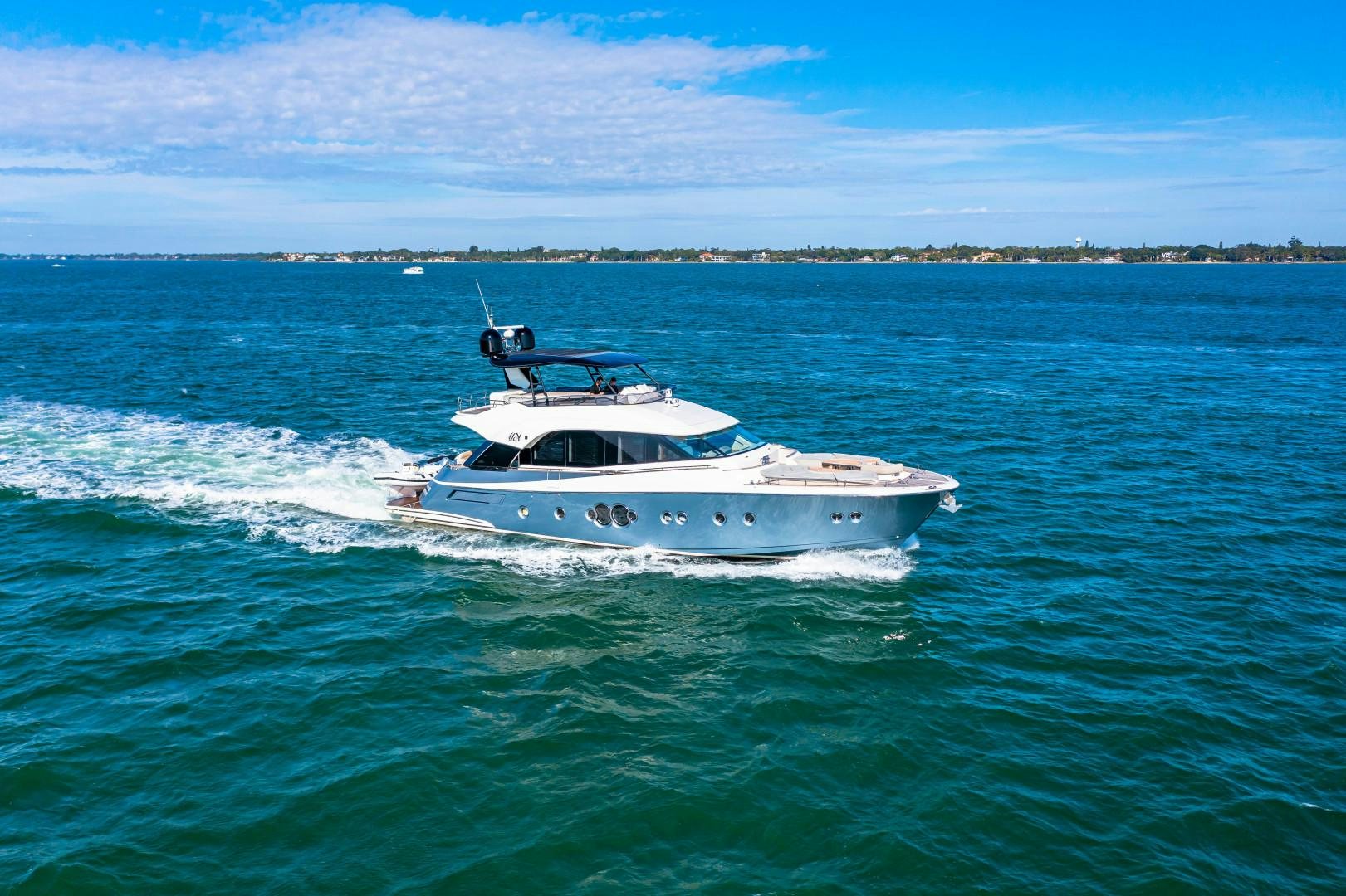 a white boat on the water aboard MONTE CARLO Yacht for Sale