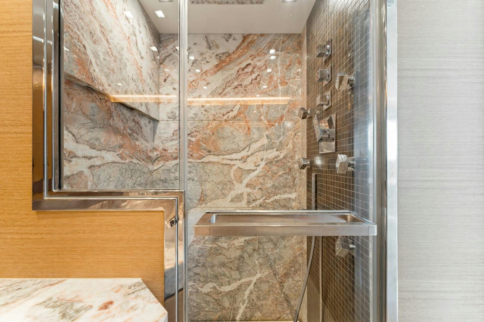 a room with a brick wall aboard MONTE CARLO Yacht for Sale