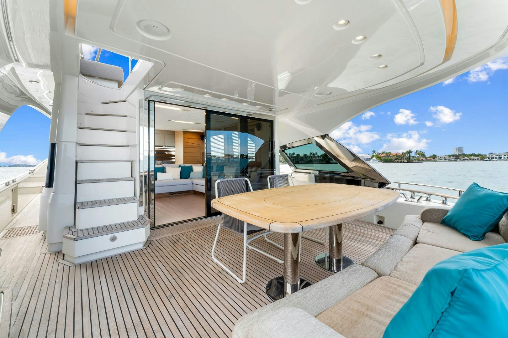 a room with a table and chairs aboard MONTE CARLO Yacht for Sale