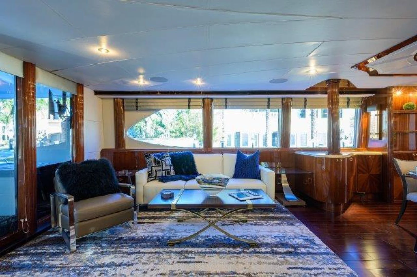a living room with a large window aboard TRYST Yacht for Sale