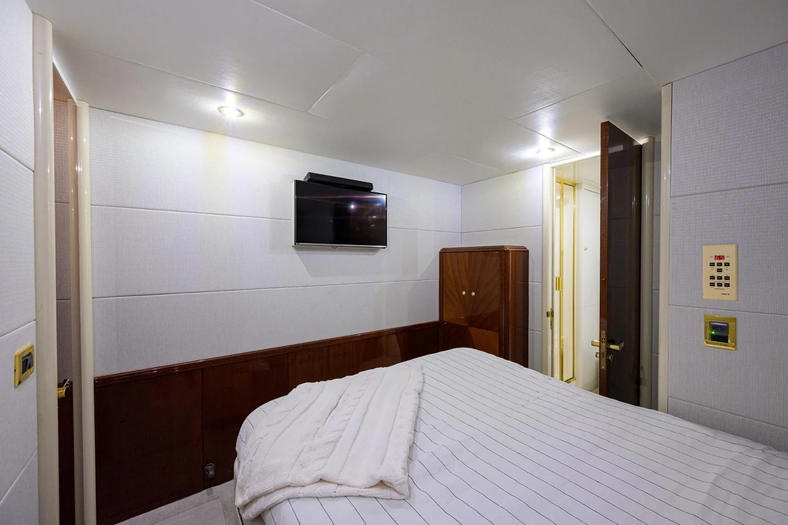 a bed in a room aboard TRYST Yacht for Sale