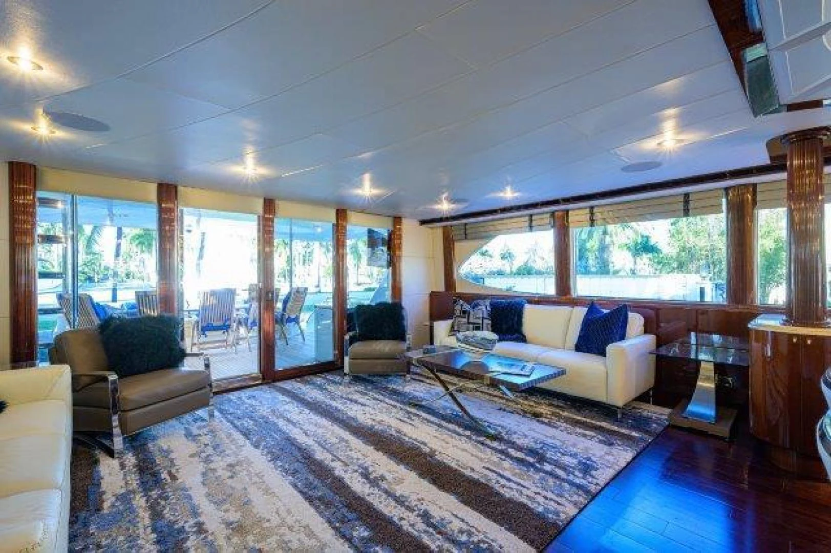 a living room with a large window aboard TRYST Yacht for Sale