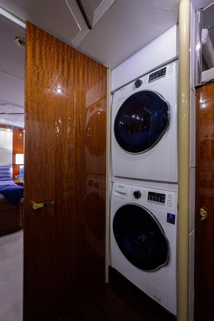 a washing machine in a room aboard TRYST Yacht for Sale