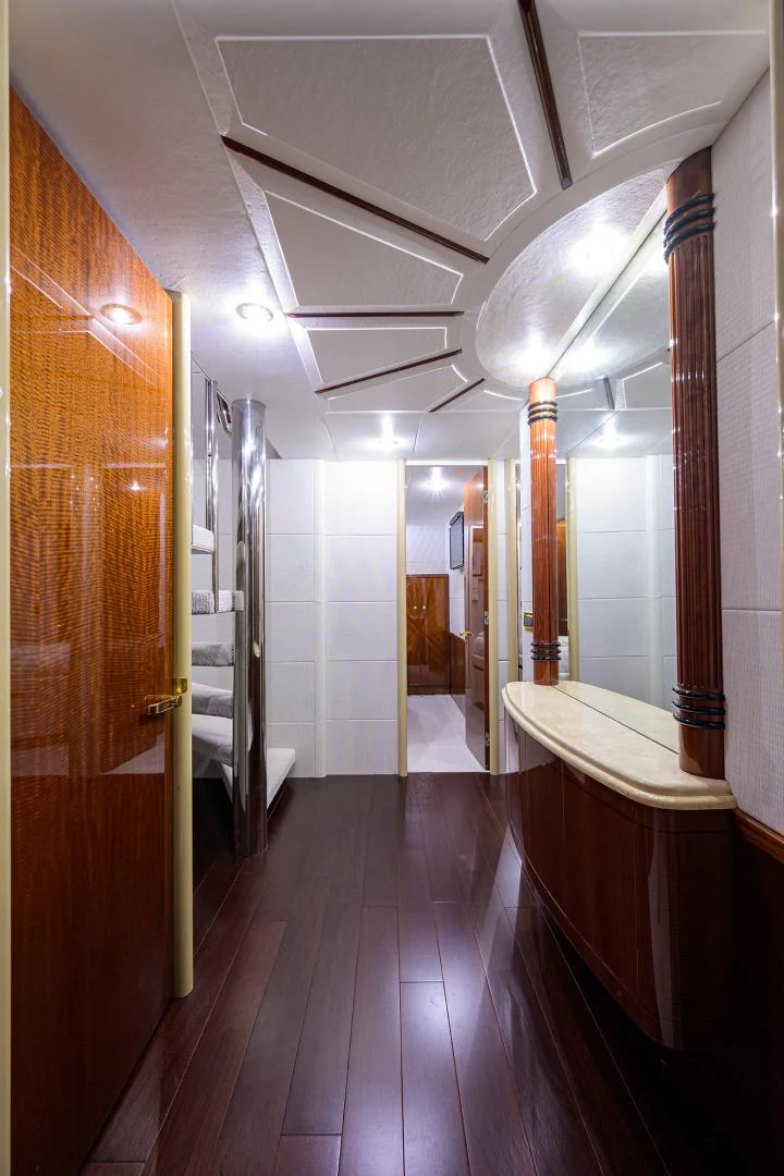 a long hallway with wood floors aboard TRYST Yacht for Sale