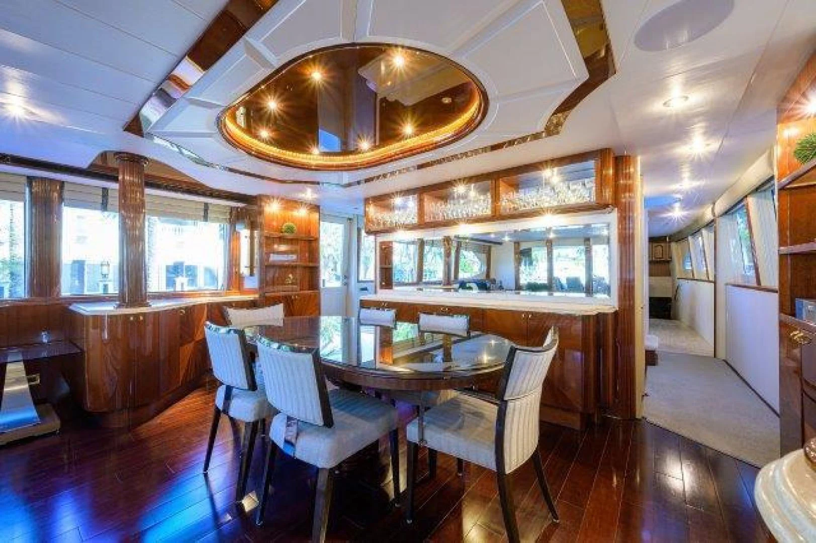a dining room with a table and chairs aboard TRYST Yacht for Sale