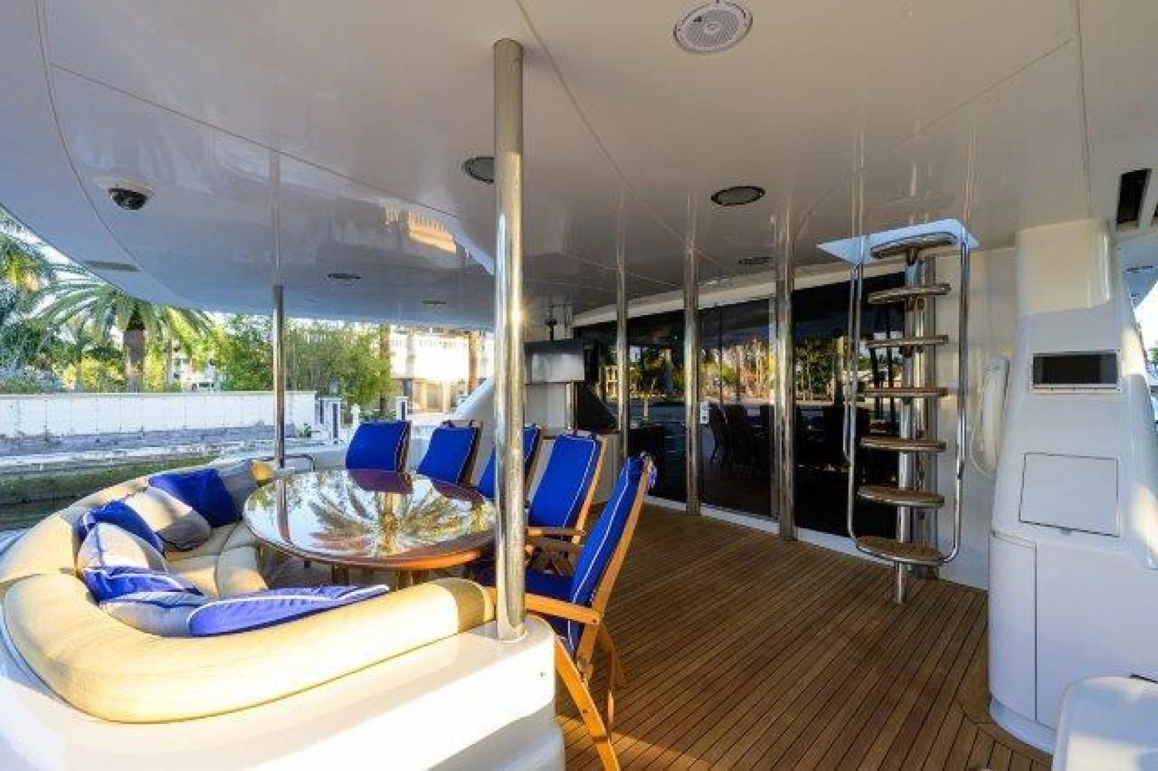 a room with a table and chairs aboard TRYST Yacht for Sale