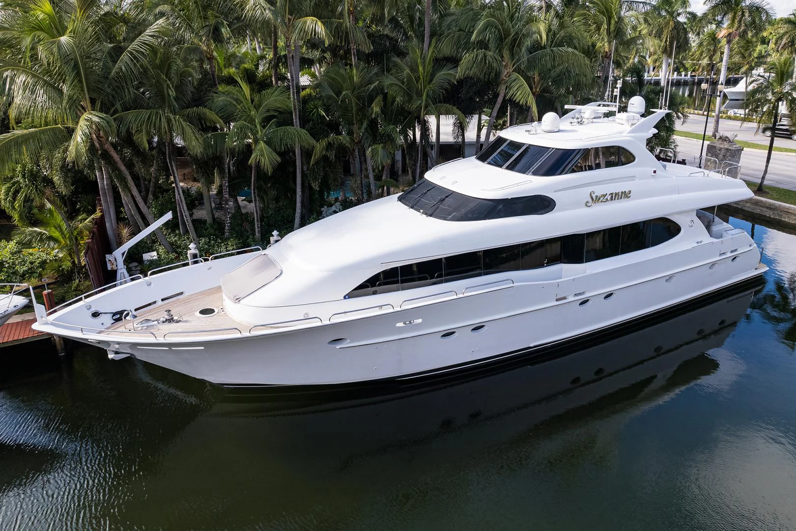 a white yacht docked aboard TRYST Yacht for Sale