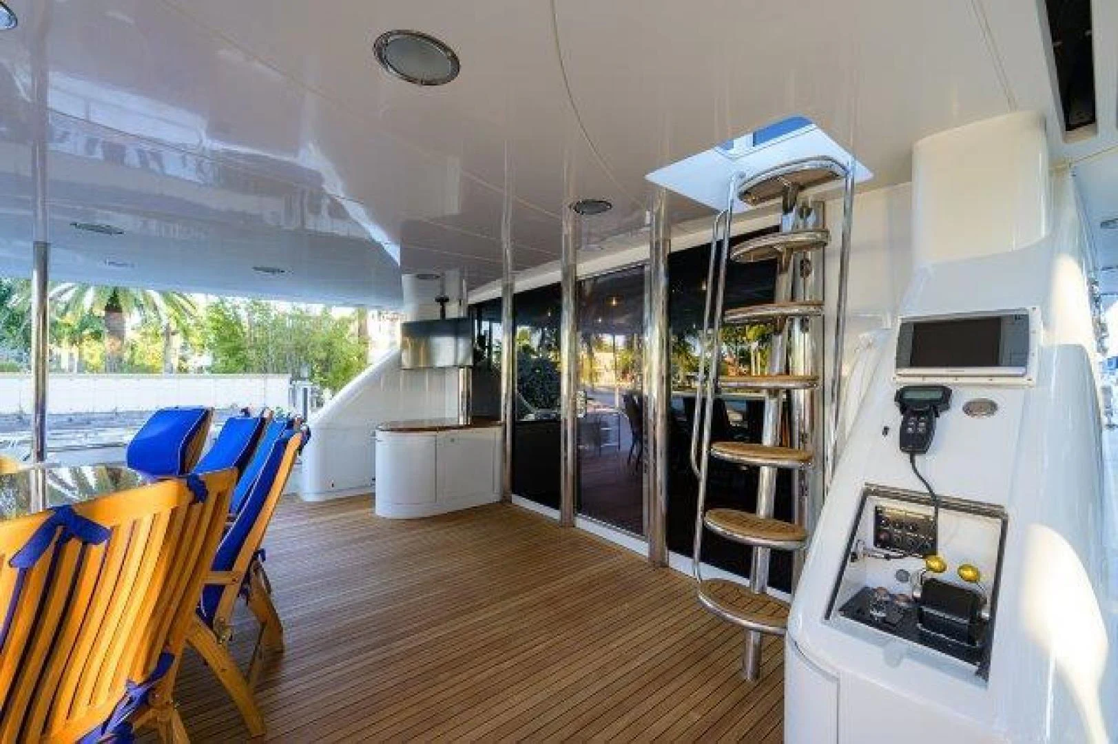 a kitchen with a glass door aboard TRYST Yacht for Sale