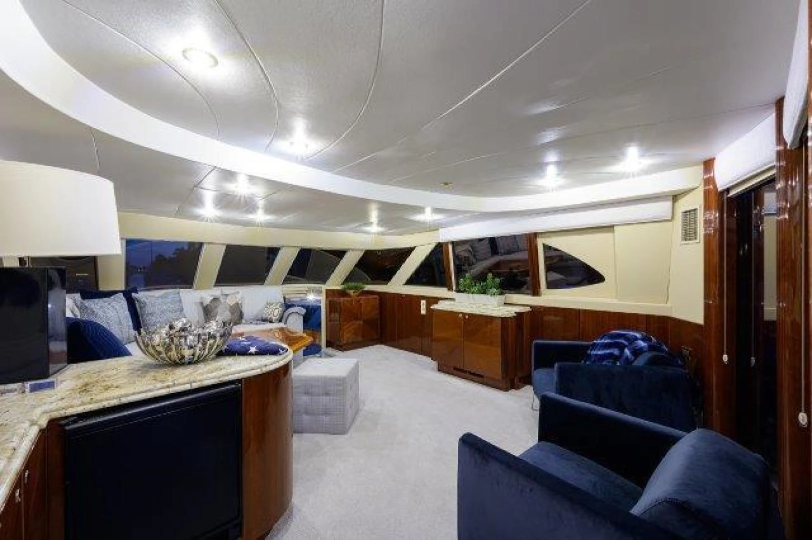 a bedroom with a large bed aboard TRYST Yacht for Sale