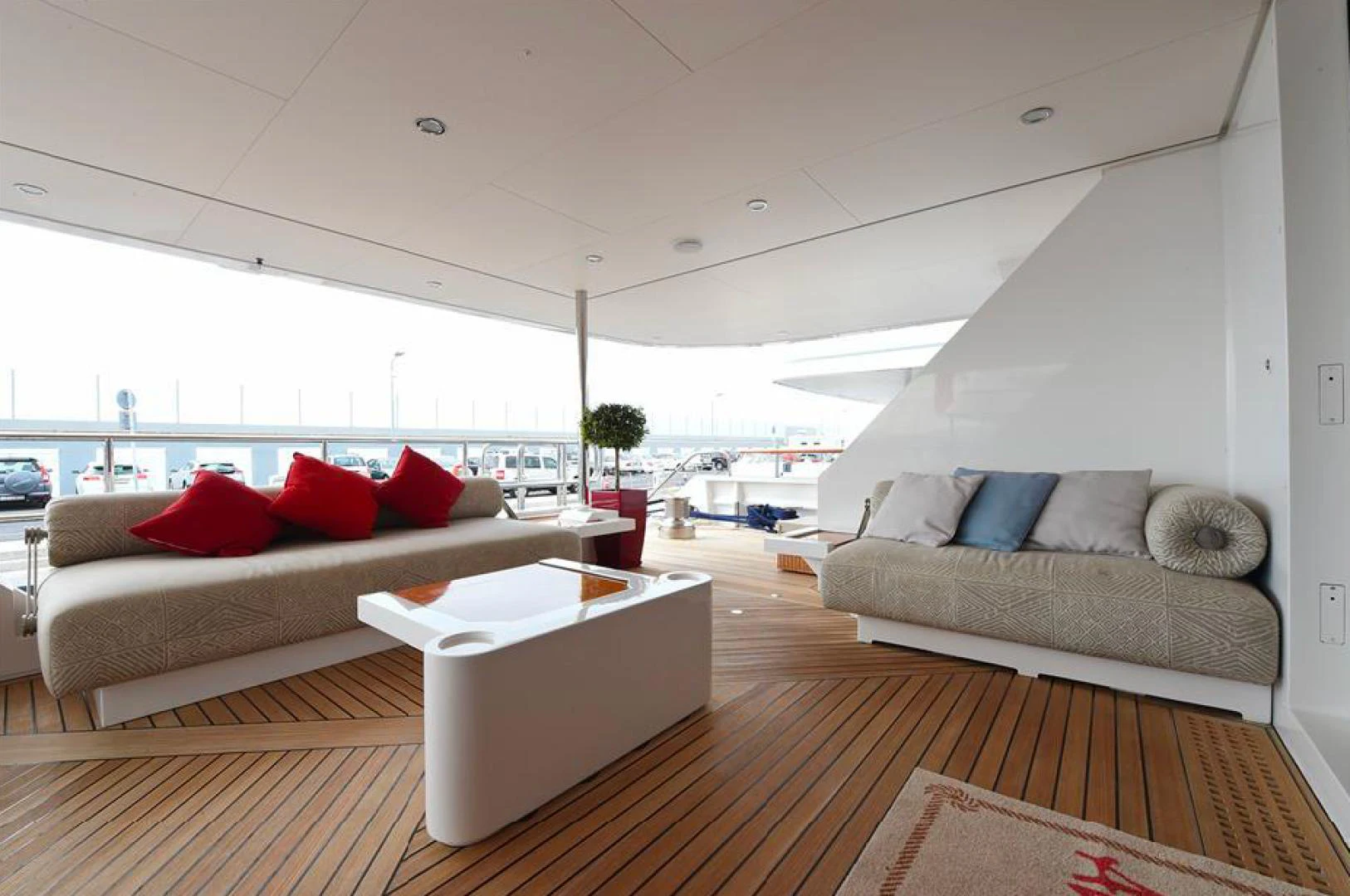 a living room with a couch and a table aboard AMORE MIO 2 Yacht for Sale
