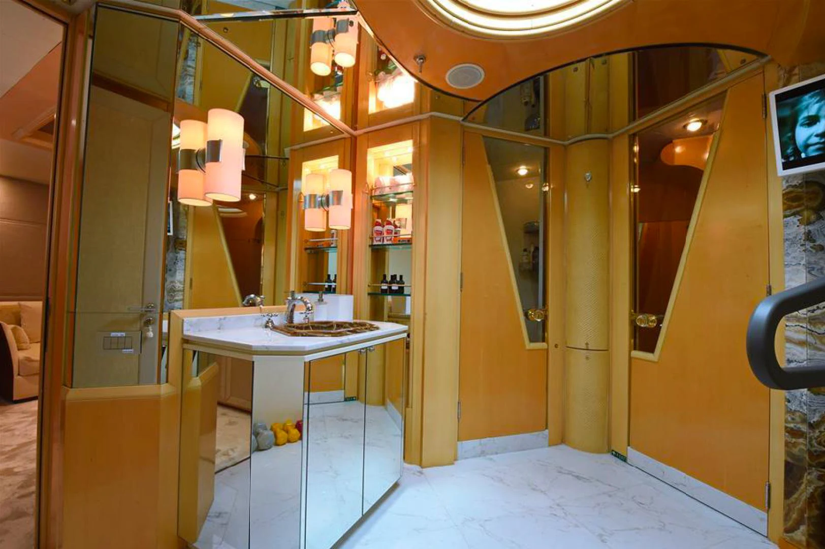 a room with a table and a desk aboard AMORE MIO 2 Yacht for Sale