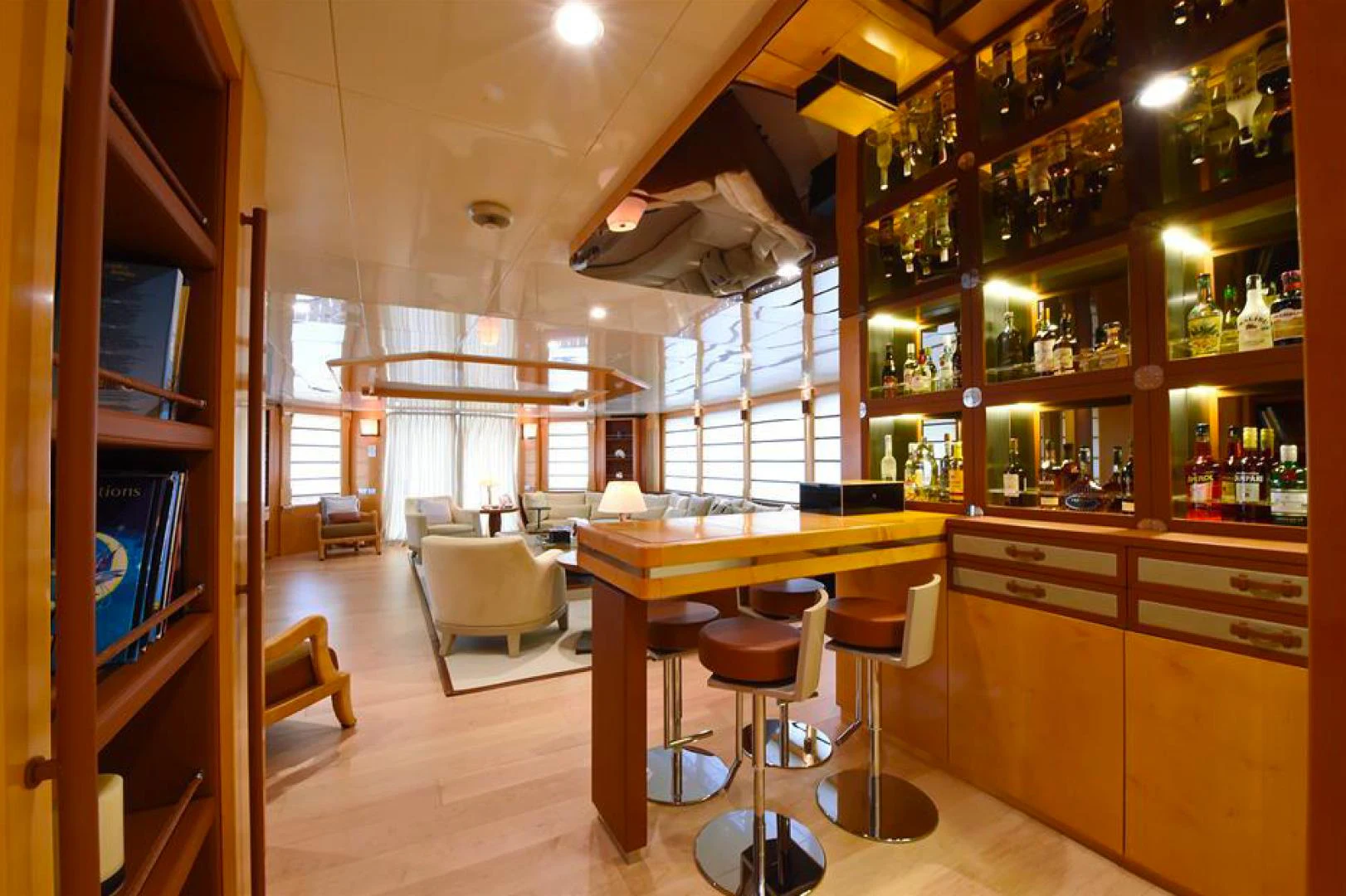 a room with a table and chairs aboard AMORE MIO 2 Yacht for Sale