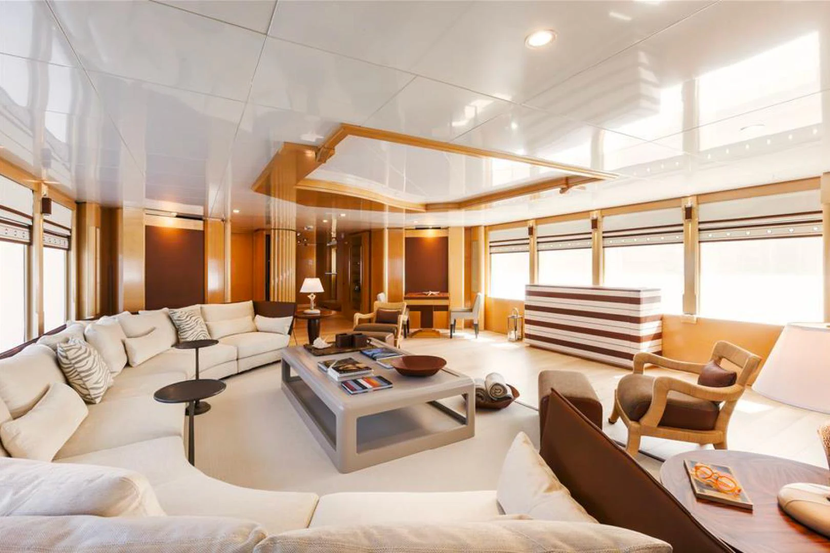 a large living room with a large window aboard AMORE MIO 2 Yacht for Sale