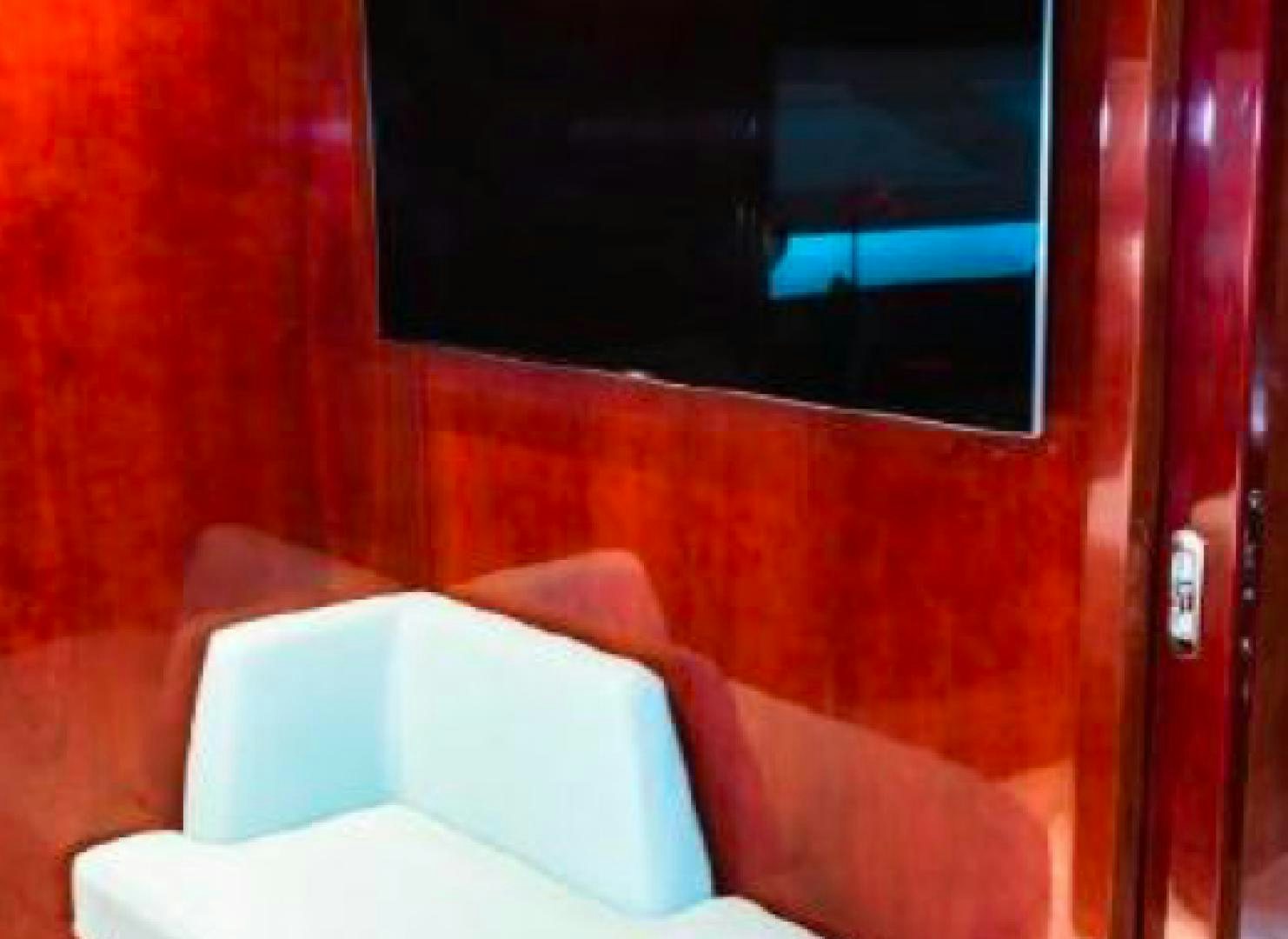 a room with a couch and a television aboard ALBATOR 2 Yacht for Sale