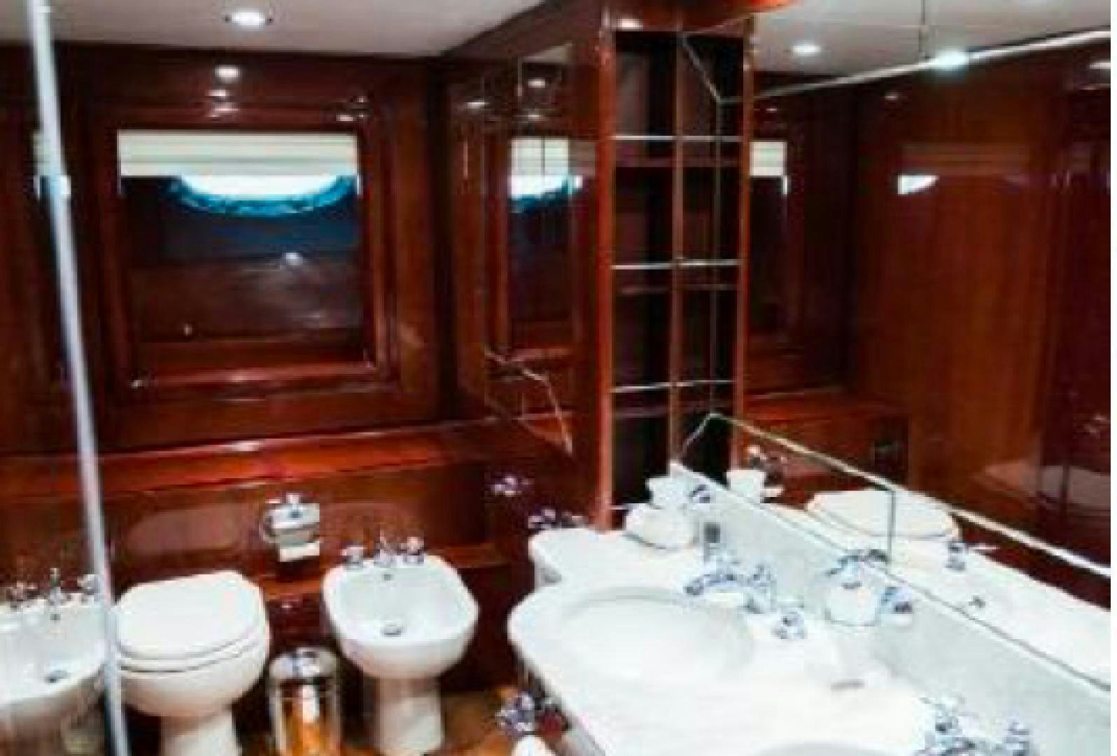 a bathroom with a sink and toilet aboard ALBATOR 2 Yacht for Sale