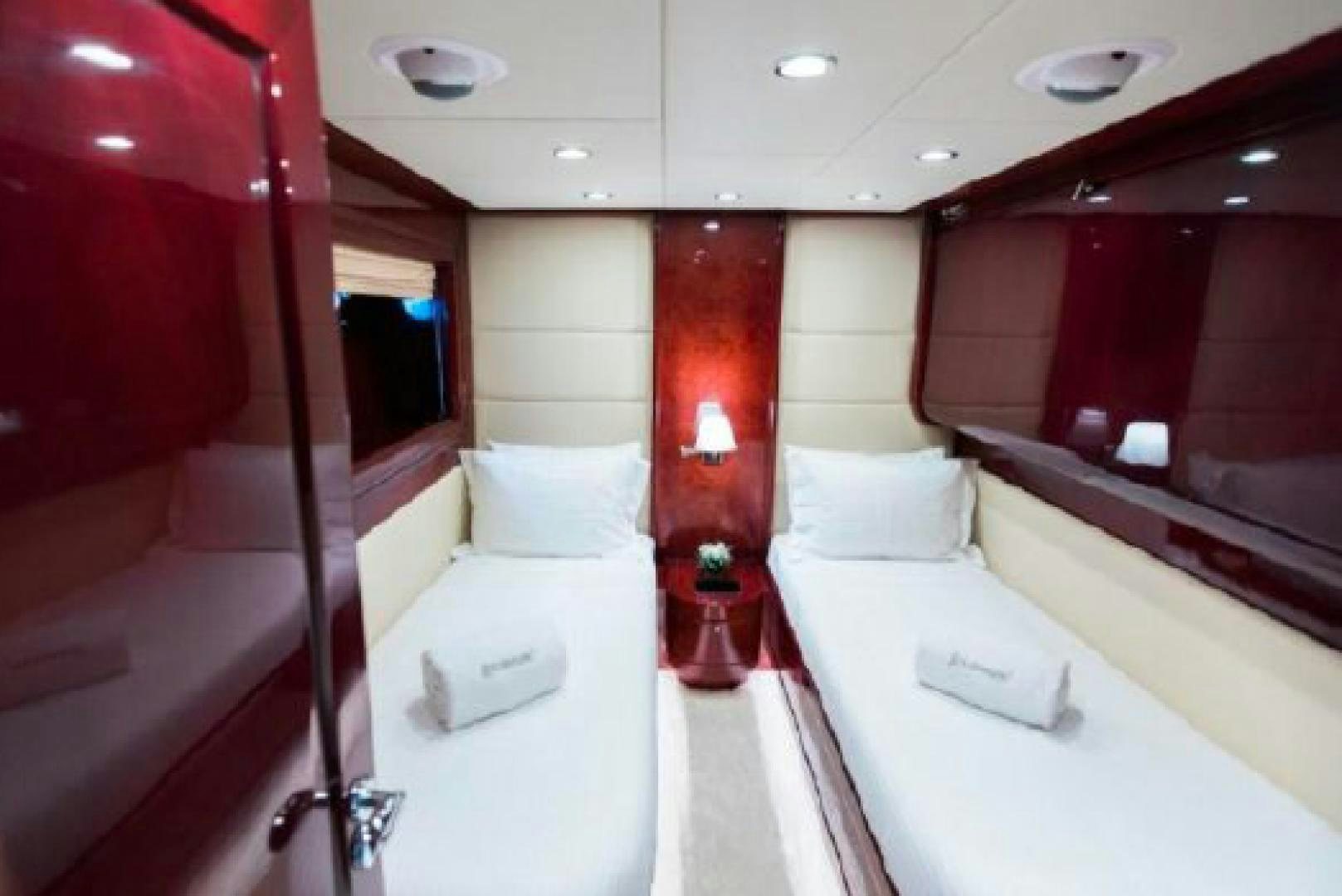 a room with a bed and a mirror aboard ALBATOR 2 Yacht for Sale