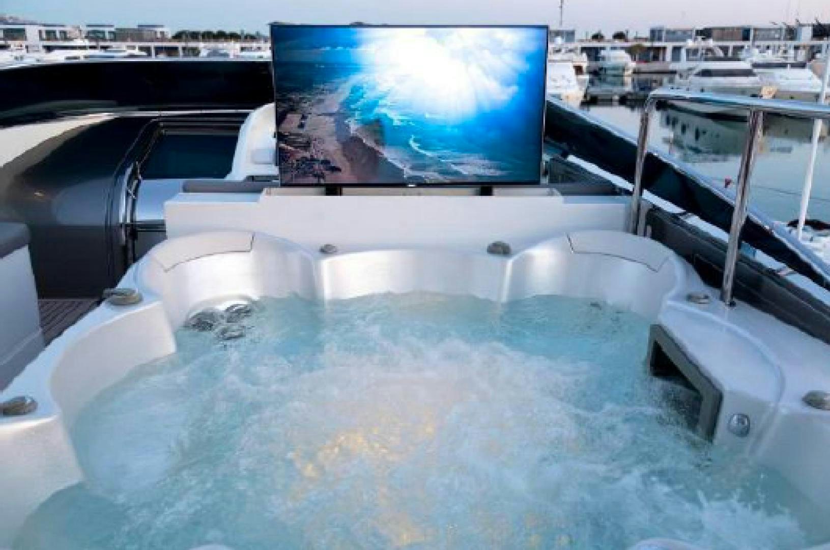 a large white boat with a large blue screen on it aboard ALBATOR 2 Yacht for Sale