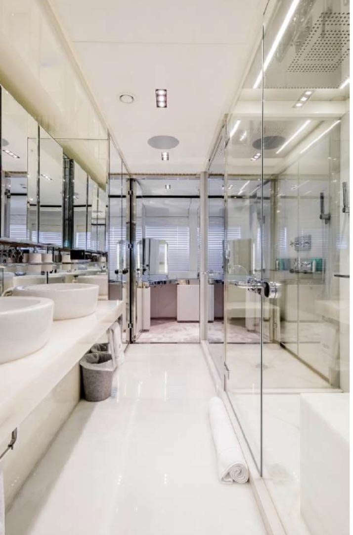 a bathroom with a sink and a shower aboard BLISS Yacht for Sale