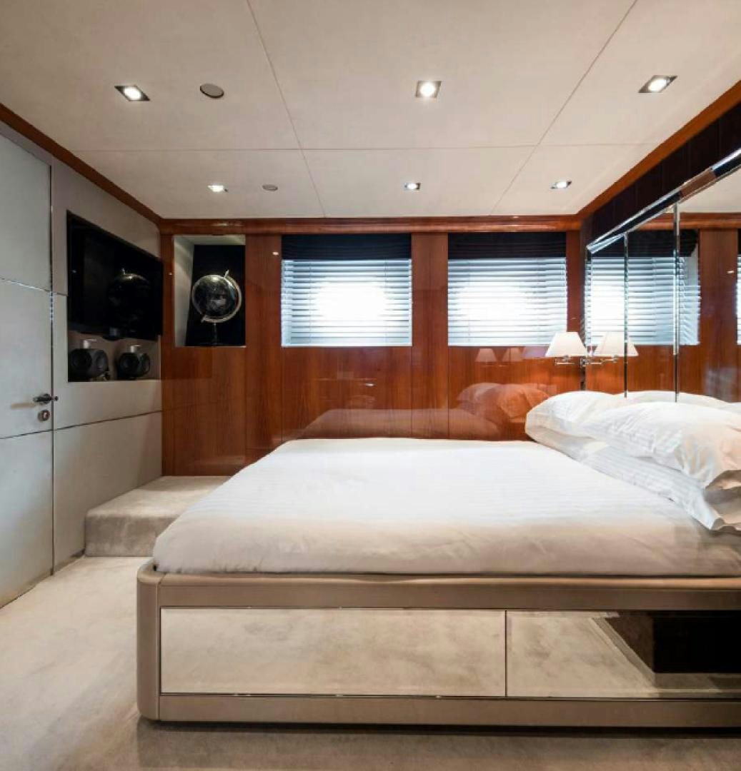 a bed in a room aboard BLISS Yacht for Charter