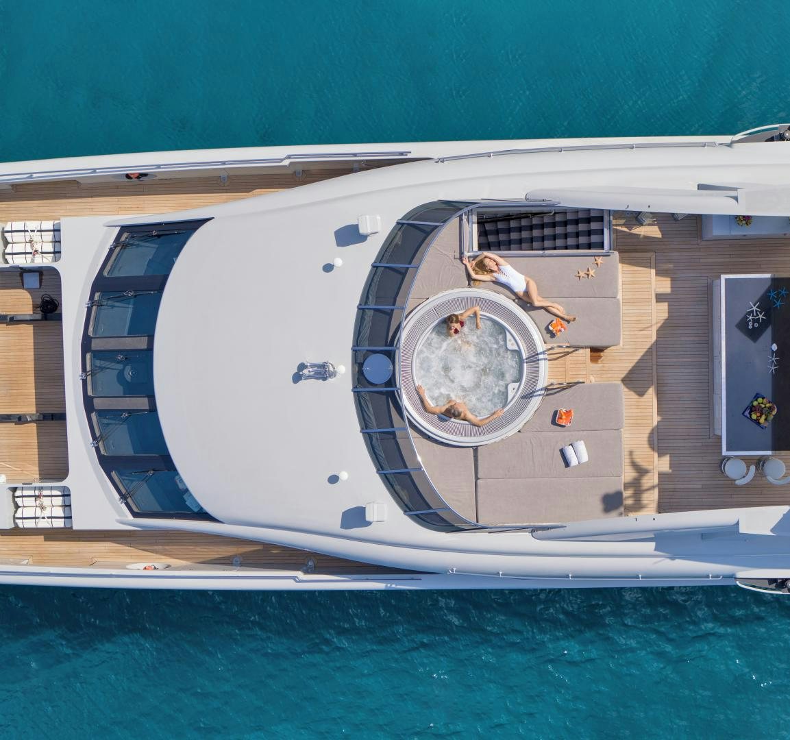 a large ship on the water aboard BLISS Yacht for Sale