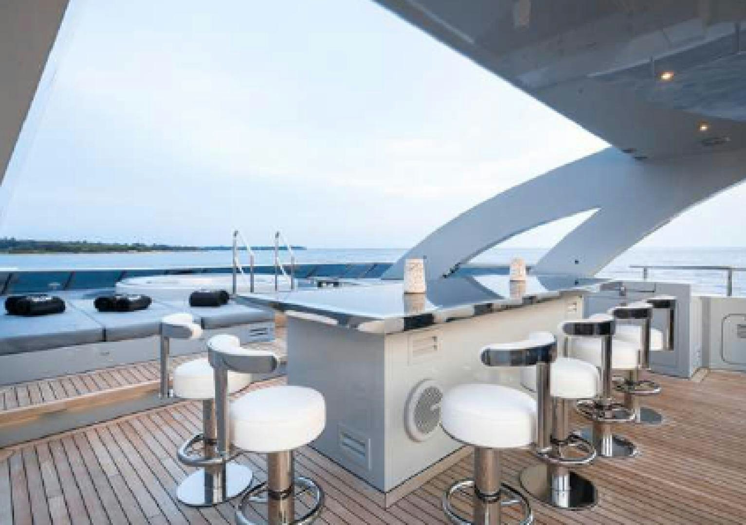 a room with a table and chairs aboard BLISS Yacht for Charter