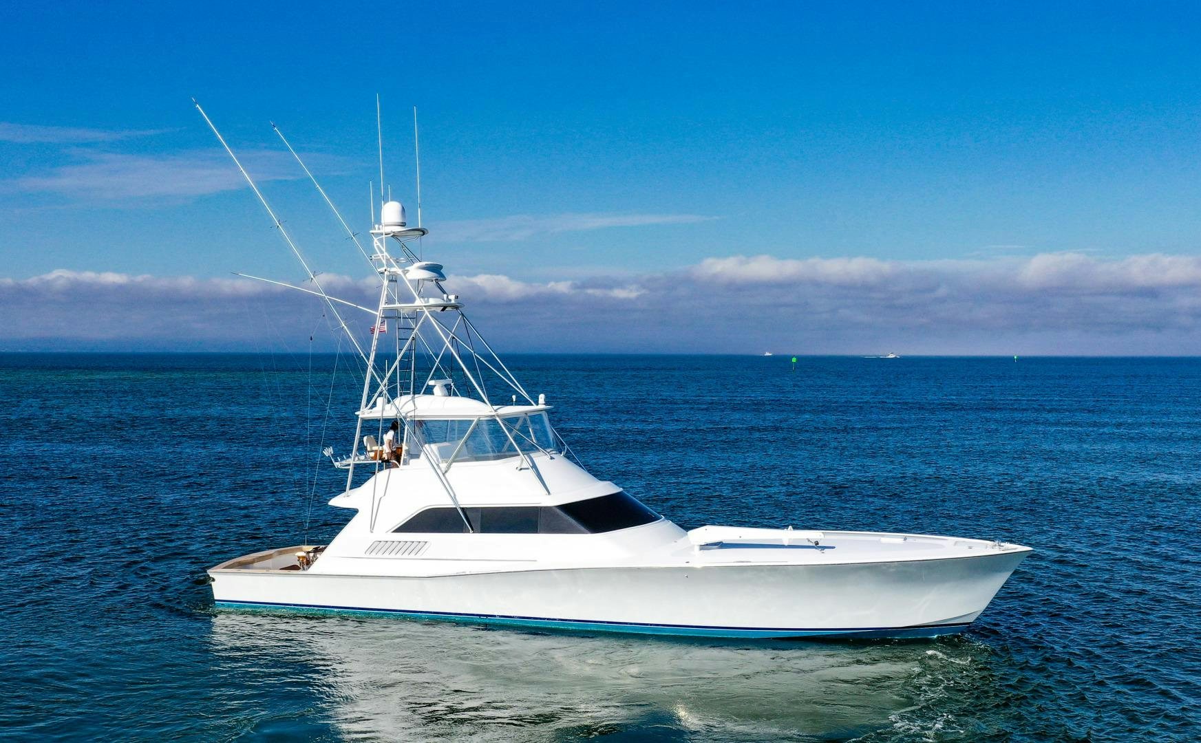 a white boat in the water aboard BANK ON Yacht for Sale