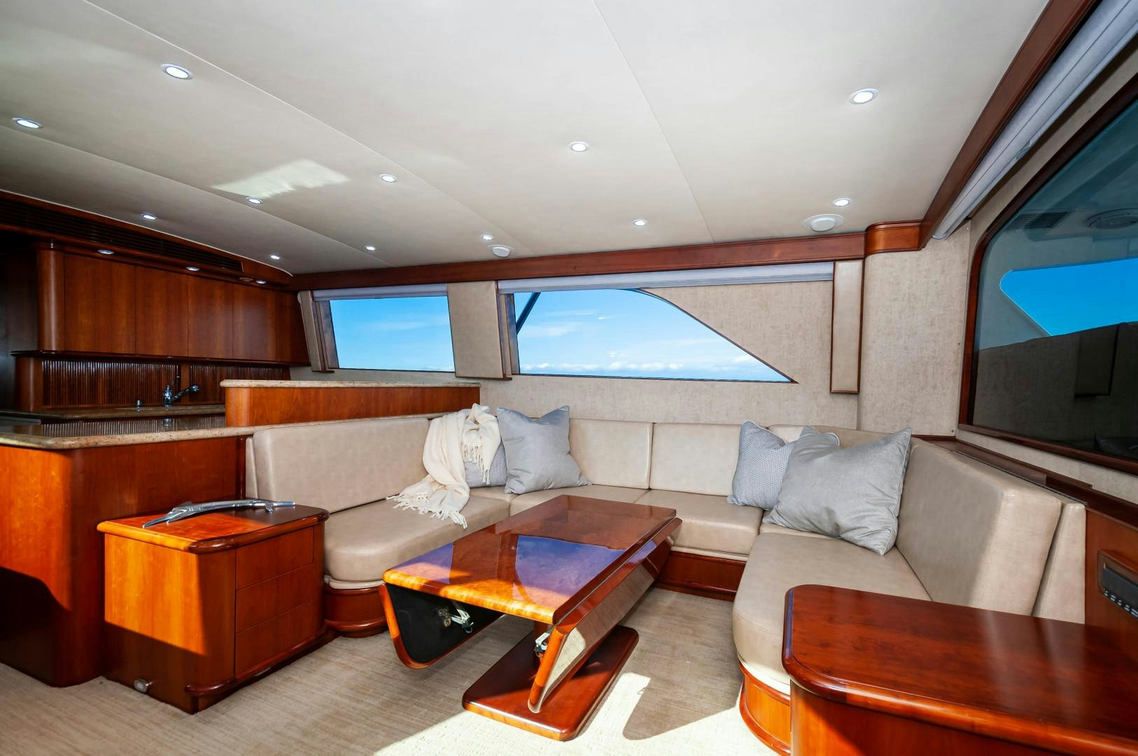 a living room with a couch and a tv aboard BANK ON Yacht for Sale