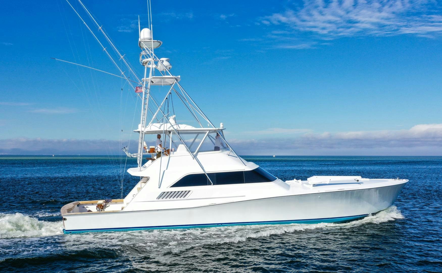 a white boat in the water aboard BANK ON Yacht for Sale