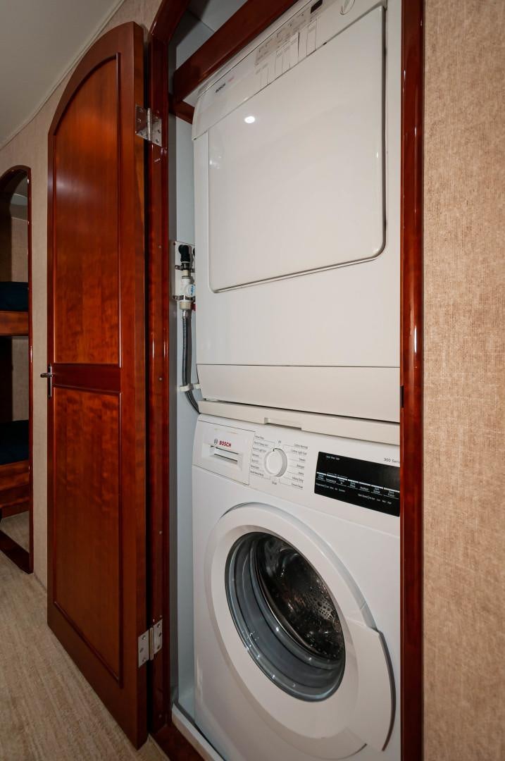 a washing machine in a room aboard BANK ON Yacht for Sale