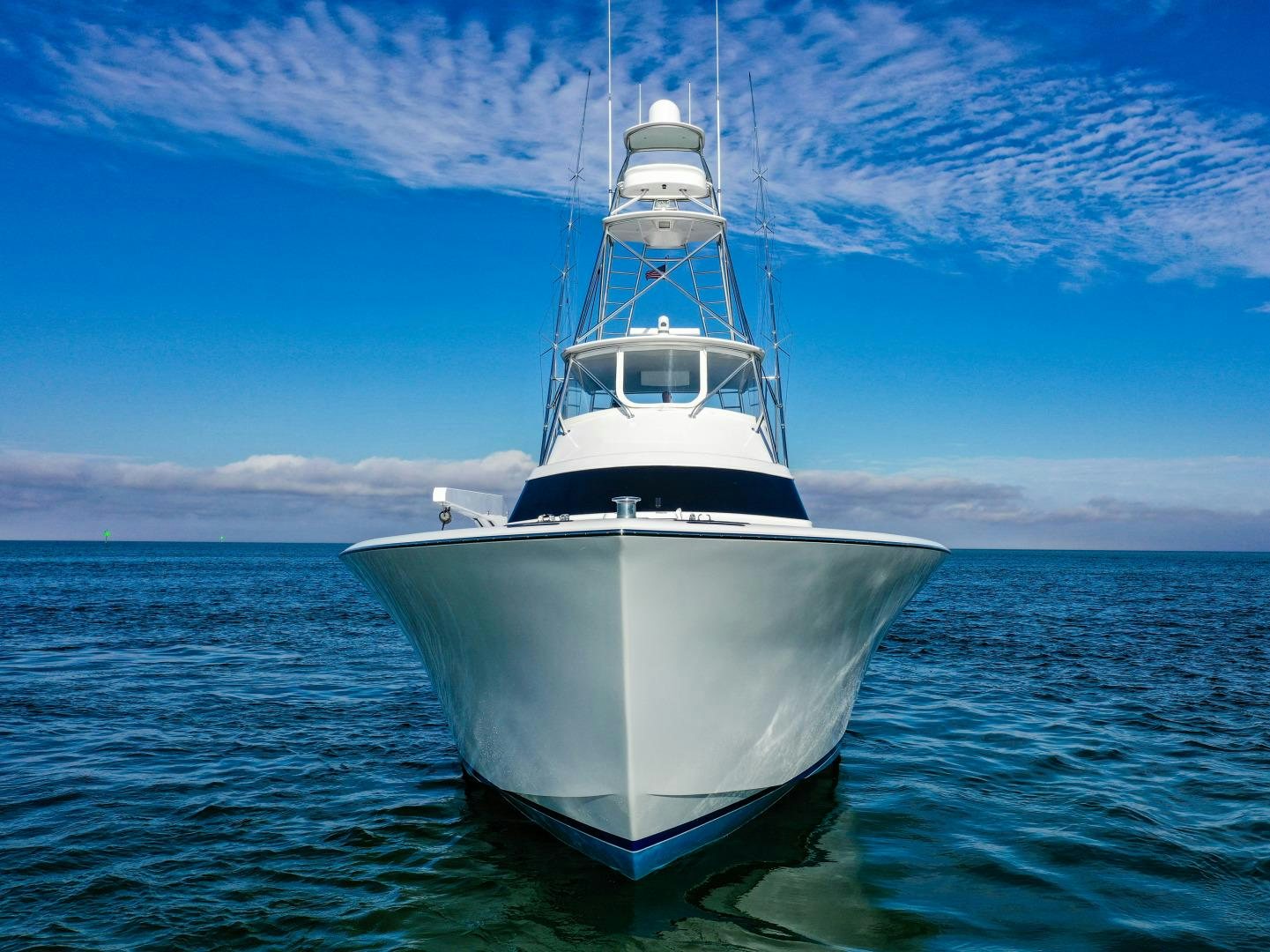 a white boat in the water aboard BANK ON Yacht for Sale