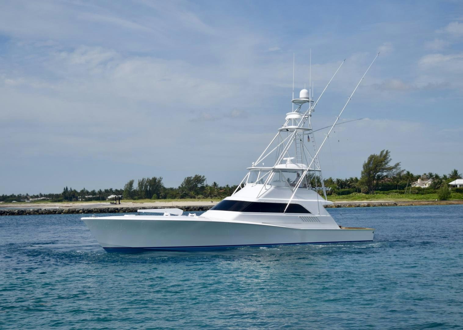 a white boat in the water aboard BANK ON Yacht for Sale