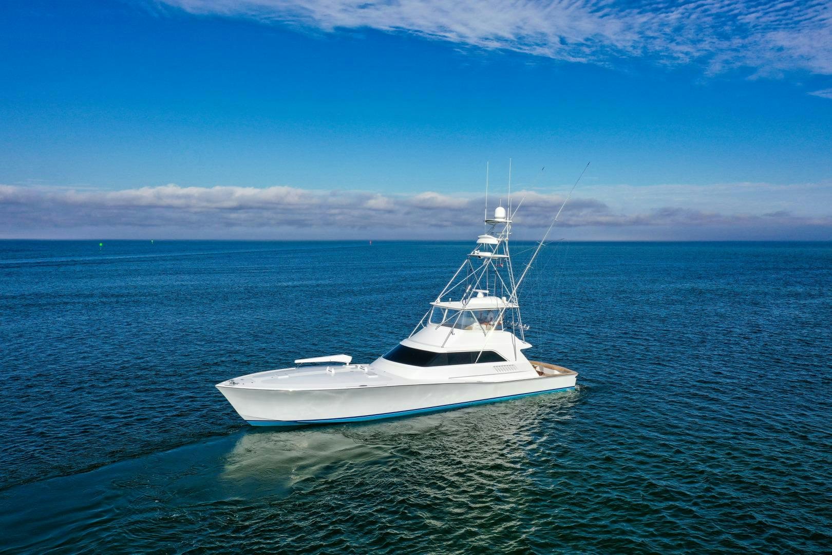 a white boat in the water aboard BANK ON Yacht for Sale