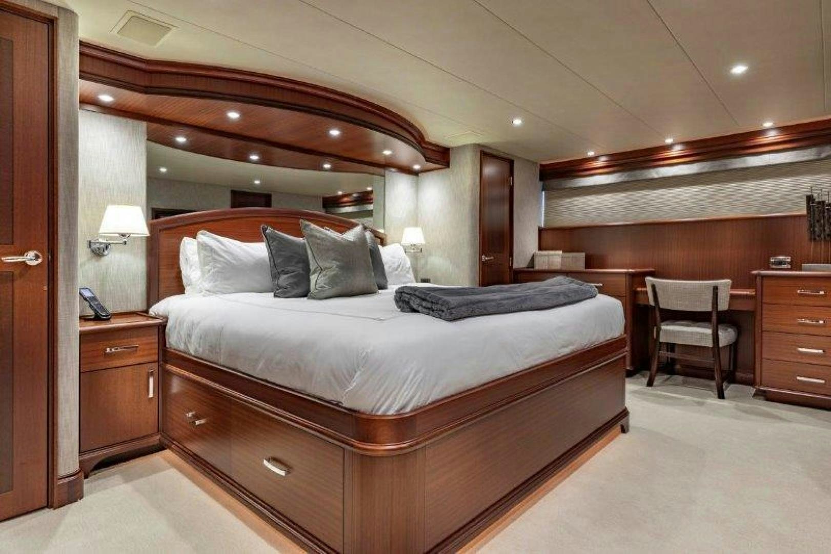 a large bed in a hotel room aboard CHERRY BOMB Yacht for Sale