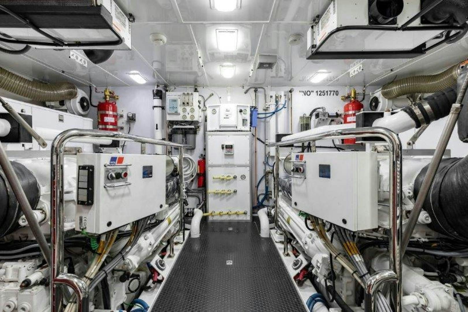 a room with machinery and pipes aboard CHERRY BOMB Yacht for Sale