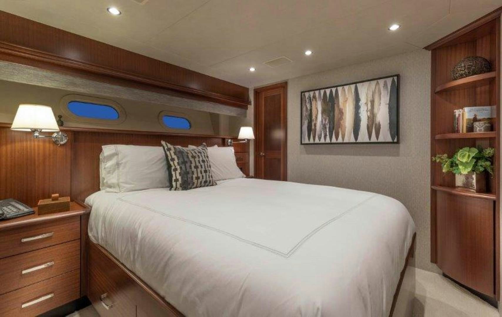a bed in a hotel room aboard CHERRY BOMB Yacht for Sale