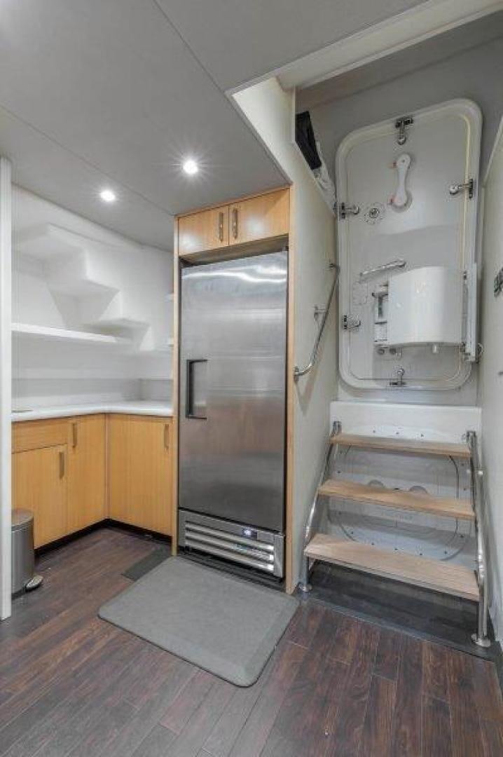 a large metal cabinet in a kitchen aboard CHERRY BOMB Yacht for Sale