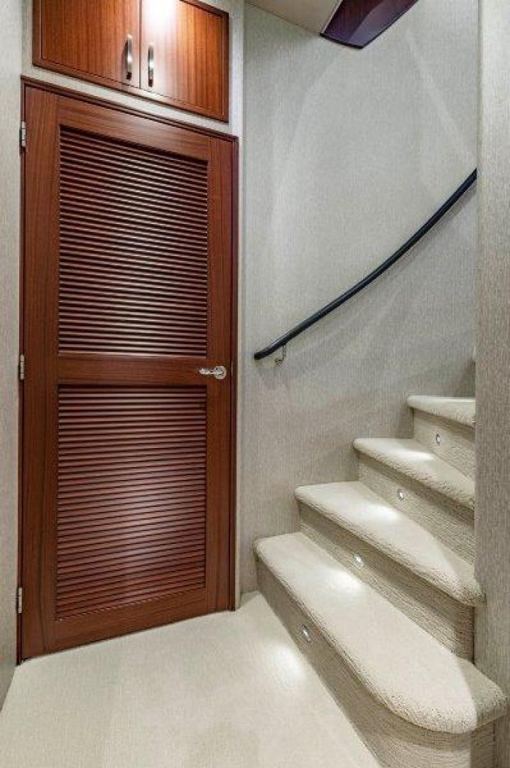 a wooden cabinet in a bathroom aboard CHERRY BOMB Yacht for Sale