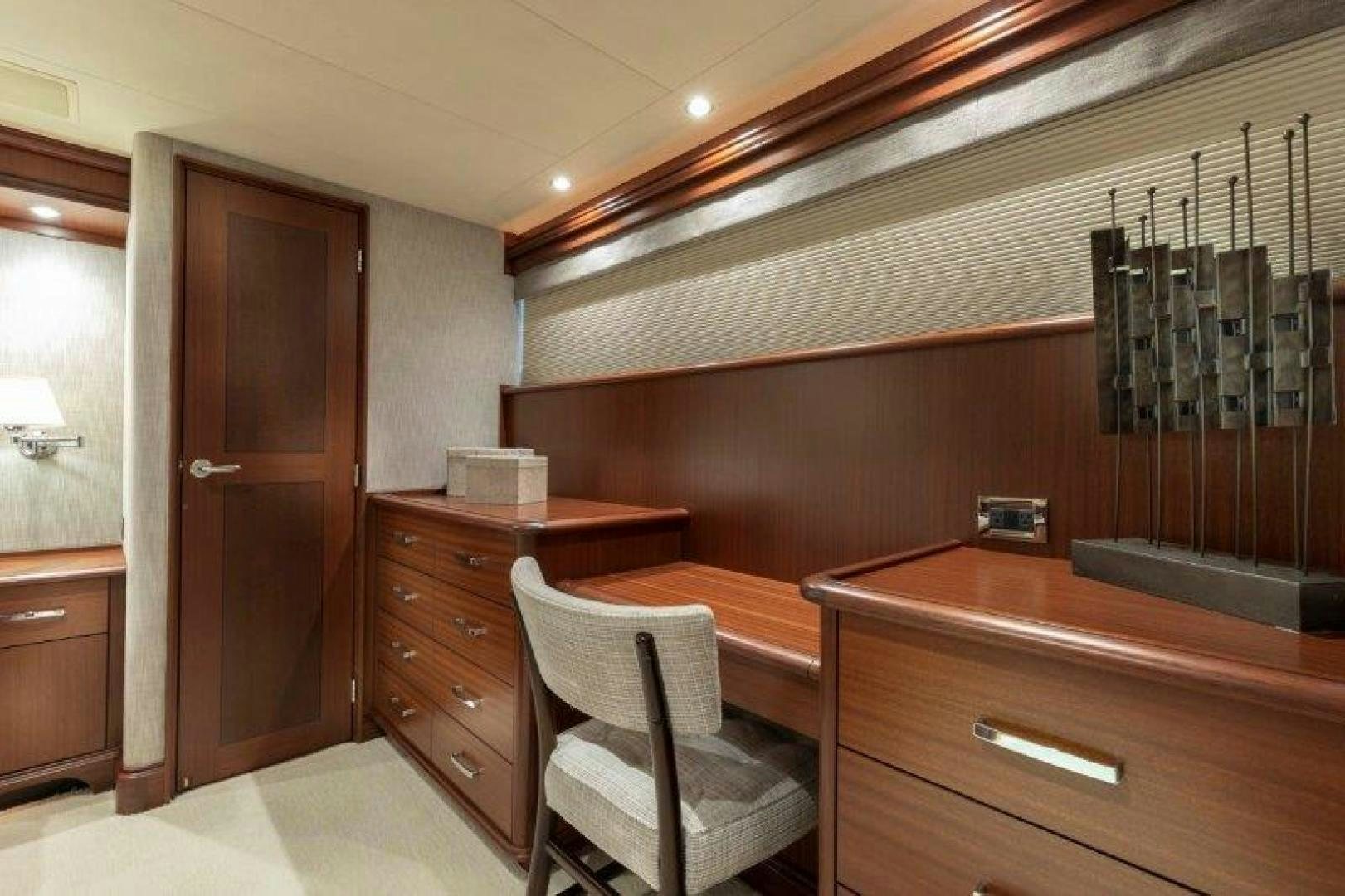 a room with a chair and a counter and a sink aboard CHERRY BOMB Yacht for Sale