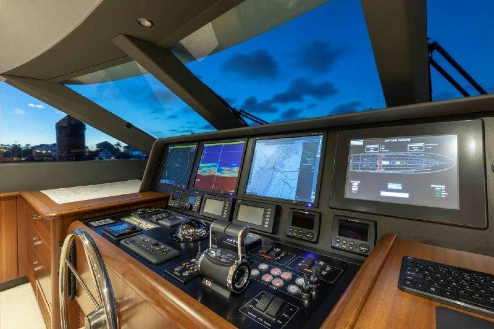 a control panel with many monitors aboard CHERRY BOMB Yacht for Sale