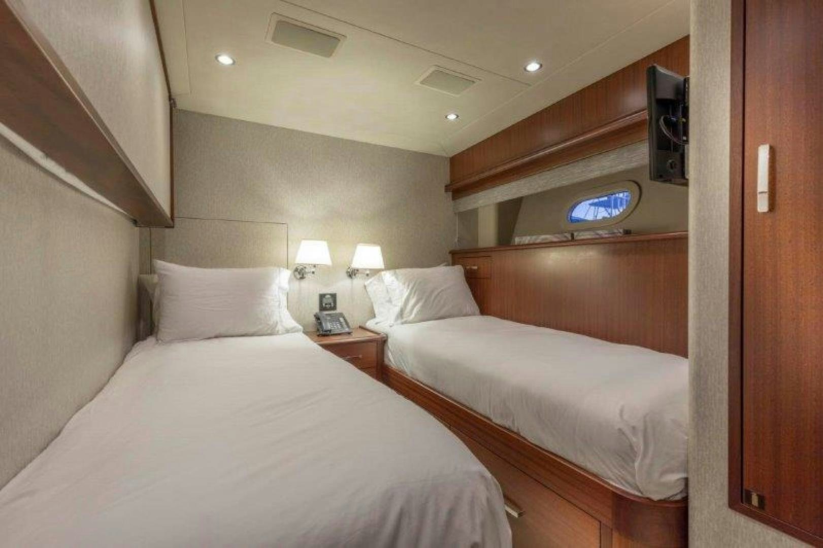 a room with two beds aboard CHERRY BOMB Yacht for Sale