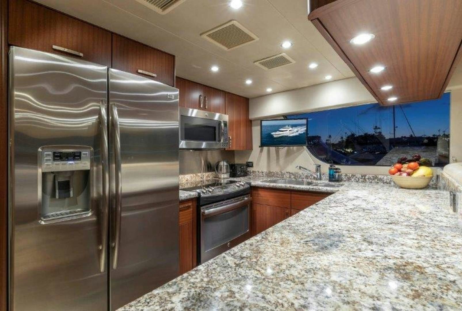 a kitchen with stainless steel appliances aboard CHERRY BOMB Yacht for Sale