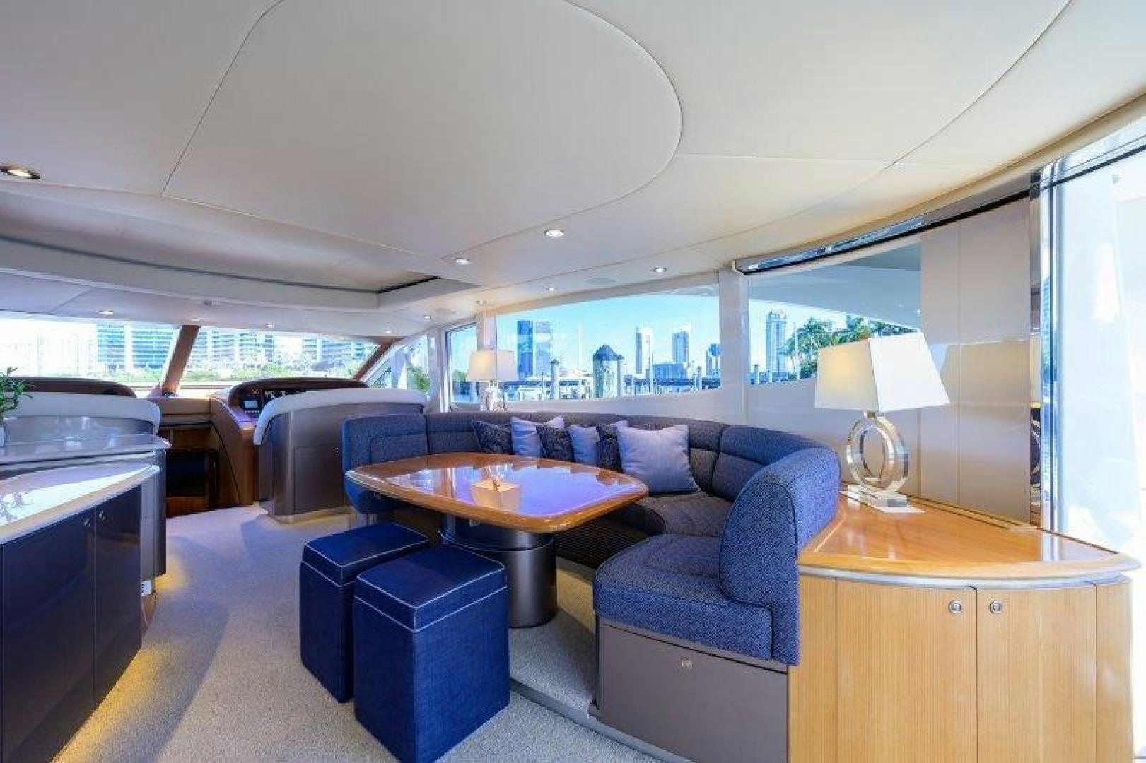 a living room with a couch and a table aboard VIRGINIA SEA Yacht for Sale